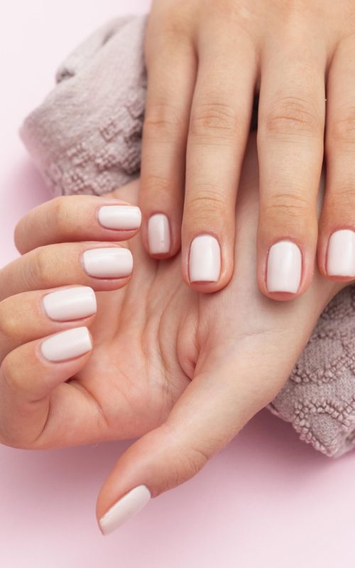 woman-showing-her-beautiful-nails